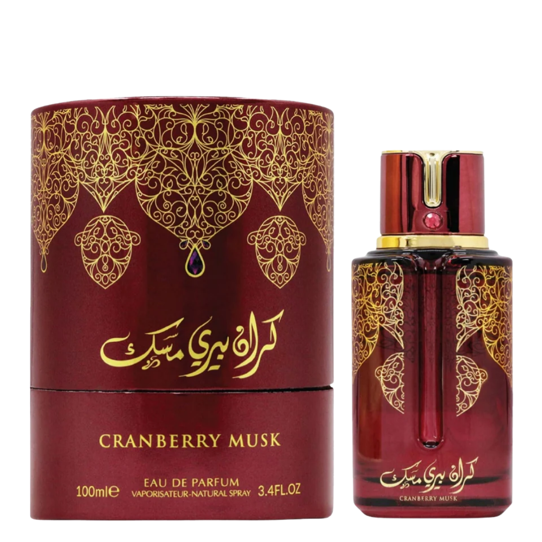 Red and gold Cranberry Musk perfume bottle and packaging on a white background