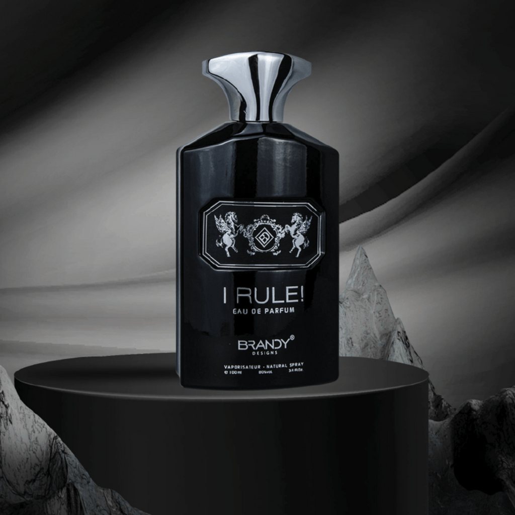 Black perfume bottle labeled 'I Rule!' on a dark background