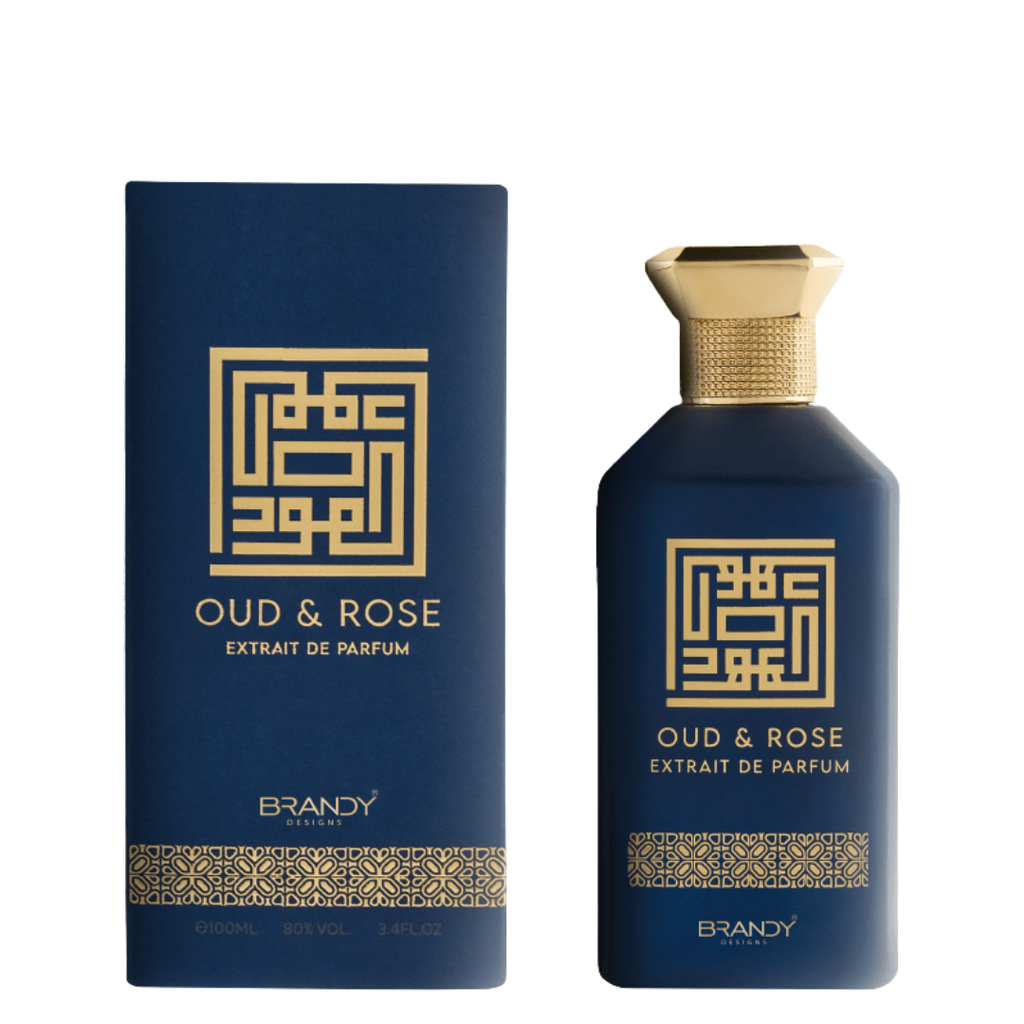 Oud & Rose extract de parfum bottle and packaging with gold geometric design on a white background