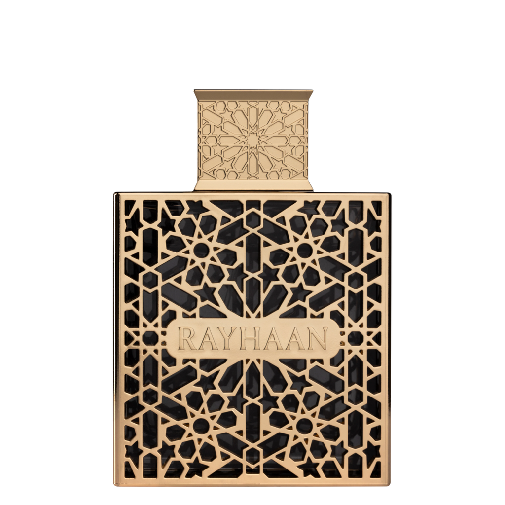 Decorative gold perfume bottle with intricate patterns and 'RAYHAAN' branding on a white background. Rayhaan Elixir