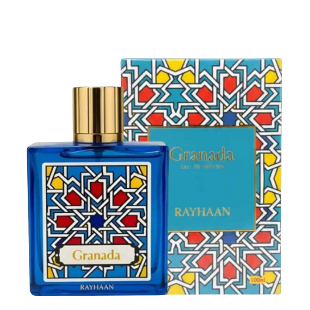 Blue perfume bottle with gold cap and colorful geometric packaging on a white background. Rayhaan Granada