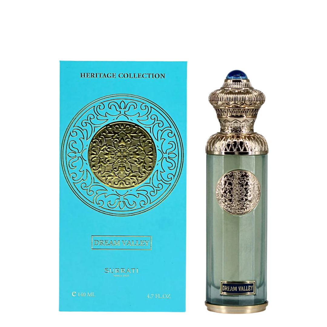 Perfume bottle and packaging of Dream Valley by Surrati with intricate design on a white background