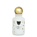 White perfume bottle with gold cap labeled 'Luxury Oud' on a white background