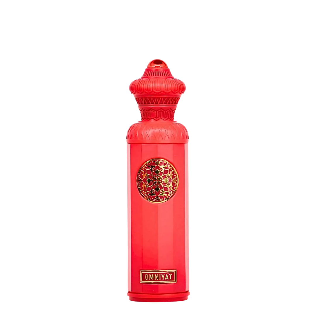 Red bottle with intricate design and 'OMNIYAT' branding on a white background