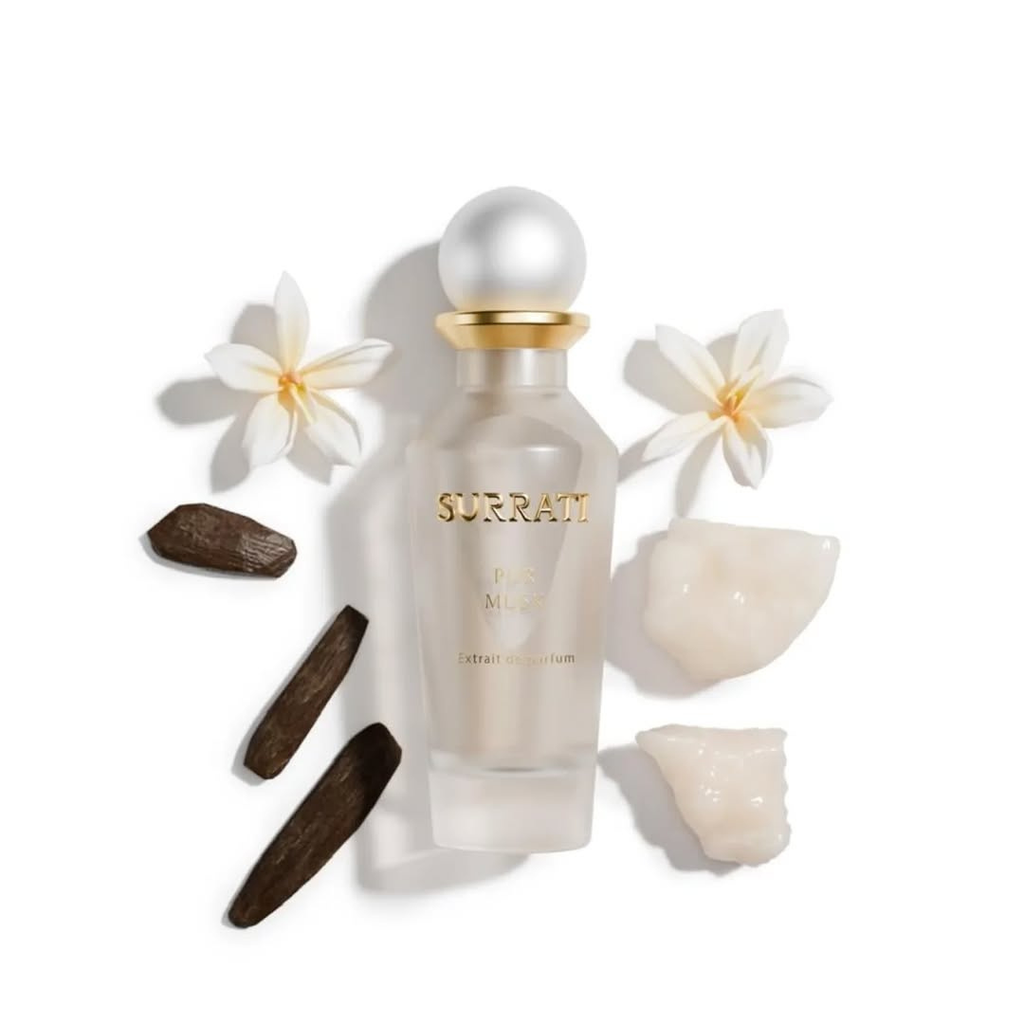 Surrati perfume bottle with flowers and rocks on a white background